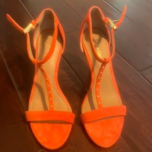 Orange Calvin Klein, never been worn size 6 heel.